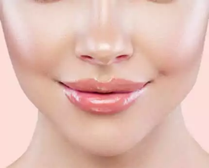 half face close up shot of a woman who underwent a lip enhancement